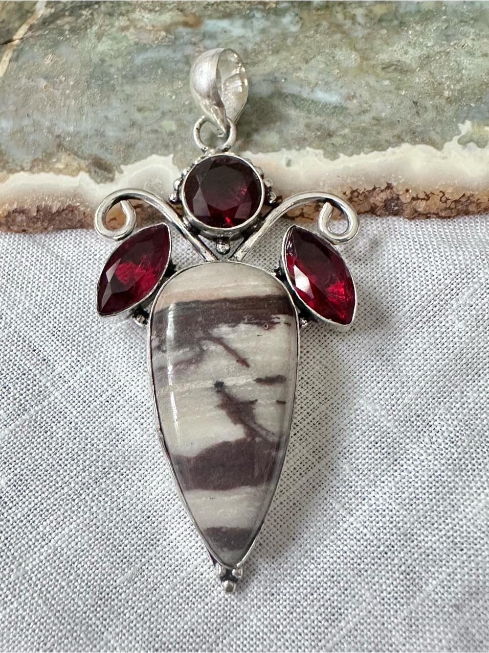Artisan Zebra Marble Jasper Pendant with Deep Red Gem Accents